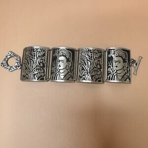 Vintage artisan Alice Seely Frida Kahlo inspired linked carved cuff bracelet.